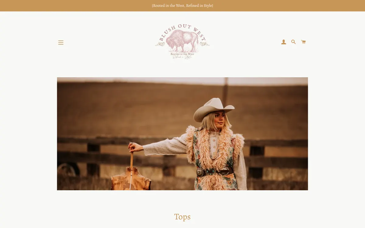 Tops collection page on desktop with a wide photo of a woman in a fringed vest leaning on a dress form in front of a fence, and the word Tops in light gold serif type below it